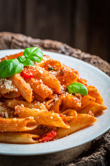 Spicy spaghetti bolognese with parmesan and basil