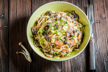 Delicious pasta with mushrooms mushrooms and parsley