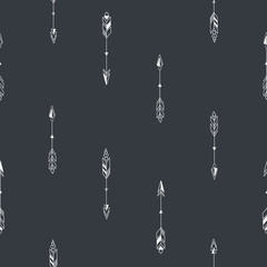 Seamless hand drawn geometric tribal pattern with arrows. Vector navajo design.