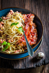 Enjoy your spaghetti Carborana made of becon, eggs and parsley