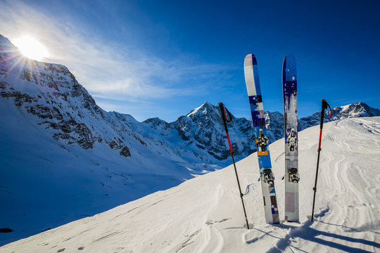 Ski in winter season, mountains and ski touring backcountry equi