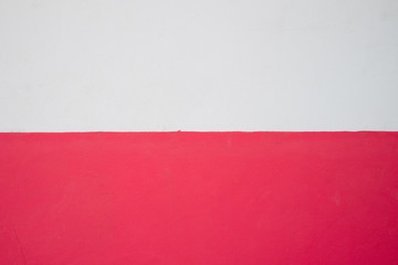 Obraz premium half of pink color cement and white color cement wall background