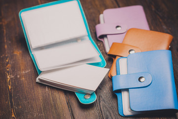 blue, orange and pink card holders