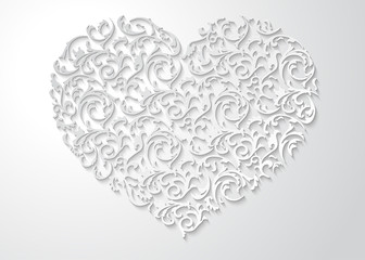 Obraz na płótnie Canvas White heart shaped floral pattern with leaves. Patterned 3d love symbol with shadow on light background. Happy Valentines day beautiful paper cut postcard