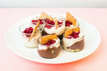 Cups with chocolate and vanilla mousse