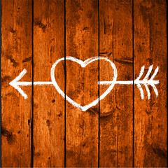 Arrow Piercing Heart on Texture Wood Planks