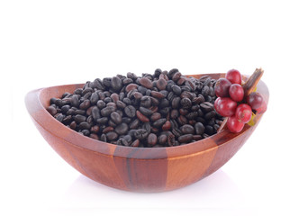 Fresh coffee beans in wood bowl on white background