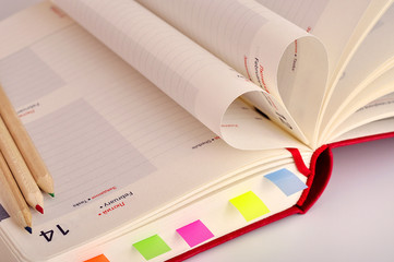 Valentines date in notebook and Heart of pages.