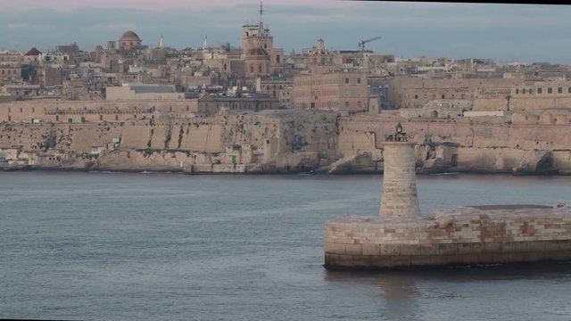 View of the Grand Harbour and city of of Valletta from the bridge wing of an arriving ship dawn. Malta