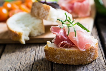 Appetizer of ciabatta with prosciutto
