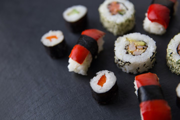Sushi pieces on dark background