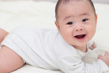 Portrait adorable baby smiling and surprise