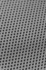 Gray mesh background, small depth of field
