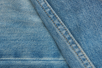 Fototapeta premium Blue jeans surface with stiches