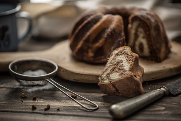 Cake. Marble cake cup of coffee powder sugar kitchen vintage utensil and fresh fruit berries.