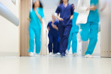 Team of doctors in a great hurry