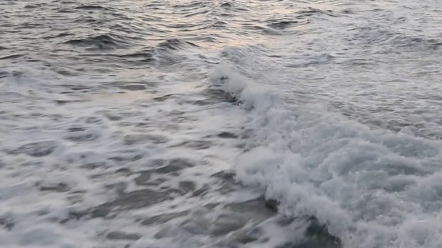 A powerful wake created by a large passenger boat shows the force behind displacing large volumes of water. Shot with a Nikon D7100 24mp camera at f8, shutter speed 60..