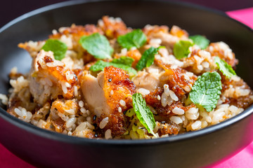 Homemade Chinese fried rice with vegetables and fried eggs