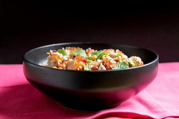 Homemade Chinese fried rice with vegetables and fried eggs