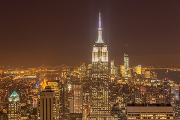 Plakat Night view of New York Manhattan during sunset