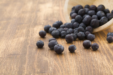 Blueberry on wooden table background