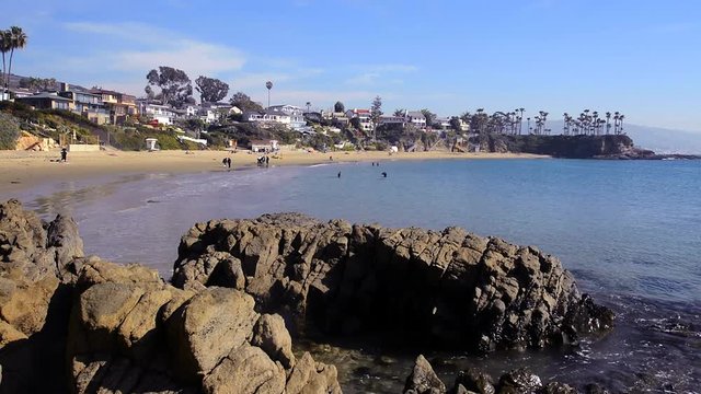 Beautiful Shaws Cove in Laguna Beach, California shows the high style of living along scenic, horseshoe oceanfront .