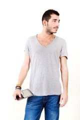 Fototapeta premium Portrait of a young man in grey shirt using tablet..