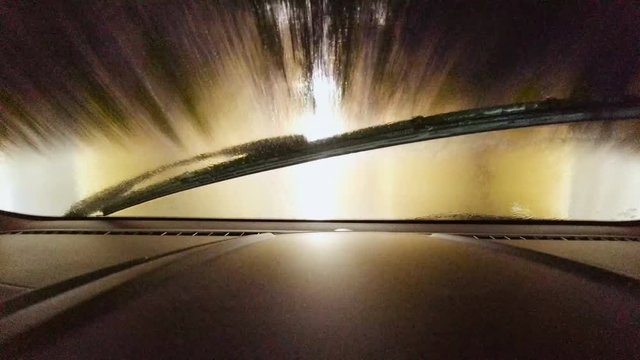 4K time lapse of vehicle being washed at automated car wash