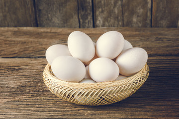 basket of duck egg on wooden