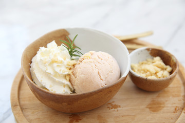 ice cream with cream on wood
