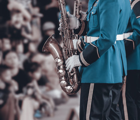 Obraz premium Saxophone / View of saxophone in military orchestra. Vintage style.