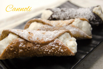 Cannoli close up. Selective focus and text. Traditional Sicilian dessert.