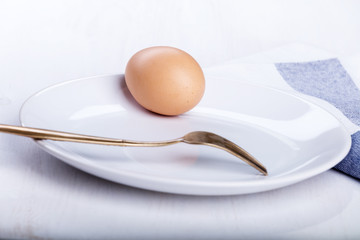 Hard-boiled egg on the plate