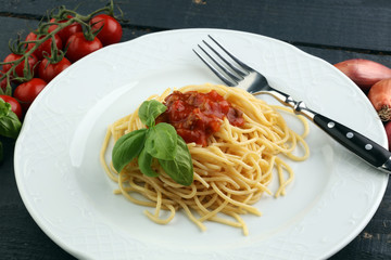 Plate of delicious spaghetti Bolognaise or Bolognese with savory