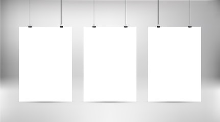 Empty white vector poster templates. Poster mock up. Template of three white blank vector posters. Set of mockups hanging on wall. Frame for paper sheet. Stock vector. 