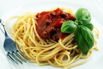 Plate of delicious spaghetti Bolognaise or Bolognese with savory