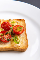 Grilled toast with camembert and cherry tomatoes
