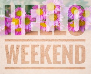 Hello weekend words on pink flower and wooden background.