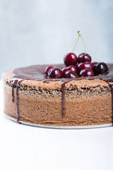 Chocolate cake with juicy cherries