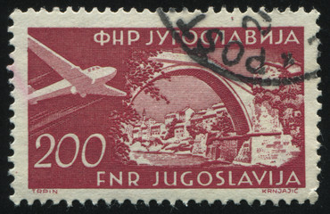 airplane and Roman Bridge