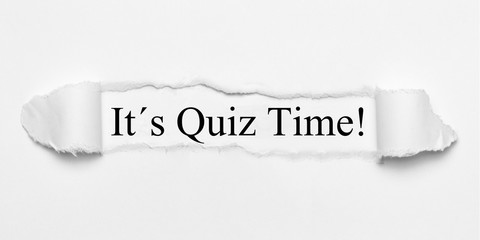 It´s Quiz Time! on white torn paper