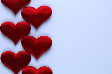 Plush small hearts on a white background.