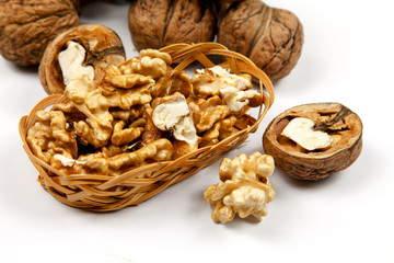 Whole walnuts and kernels on the table