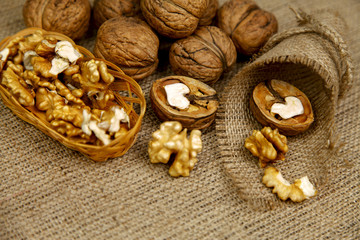 Whole walnuts and kernels on the table