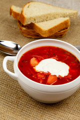Traditional Ukrainian borsch with sour cream