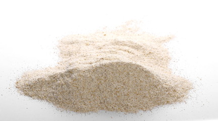 pile whole grain barley flour isolated on white background
