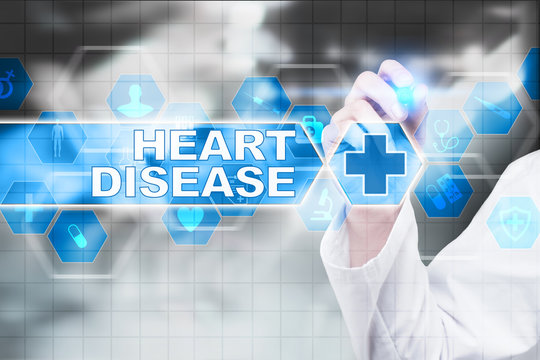 Medical doctor drawing heart disease on the virtual screen.
