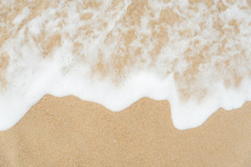 Wave on the sand beach background