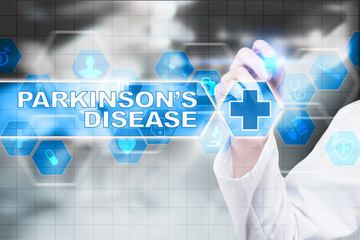 Medical doctor drawing parkinson?s disease on the virtual screen.