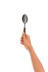 Woman hand holding an empty spoon, composition isolated on white
